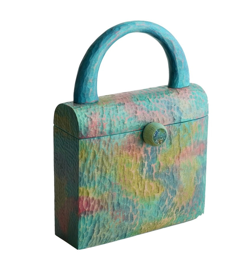 樹の鞄 　虹色の雲