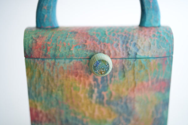 樹の鞄 　虹色の雲