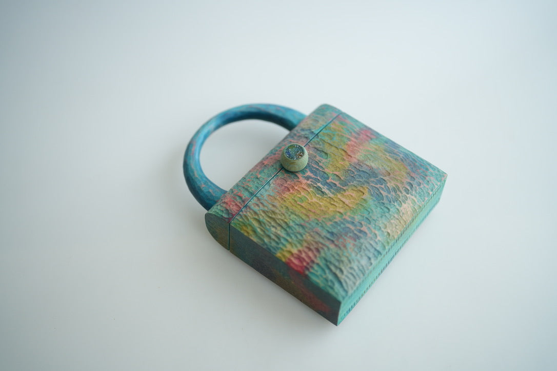 樹の鞄 　虹色の雲