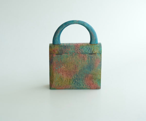 樹の鞄 　虹色の雲