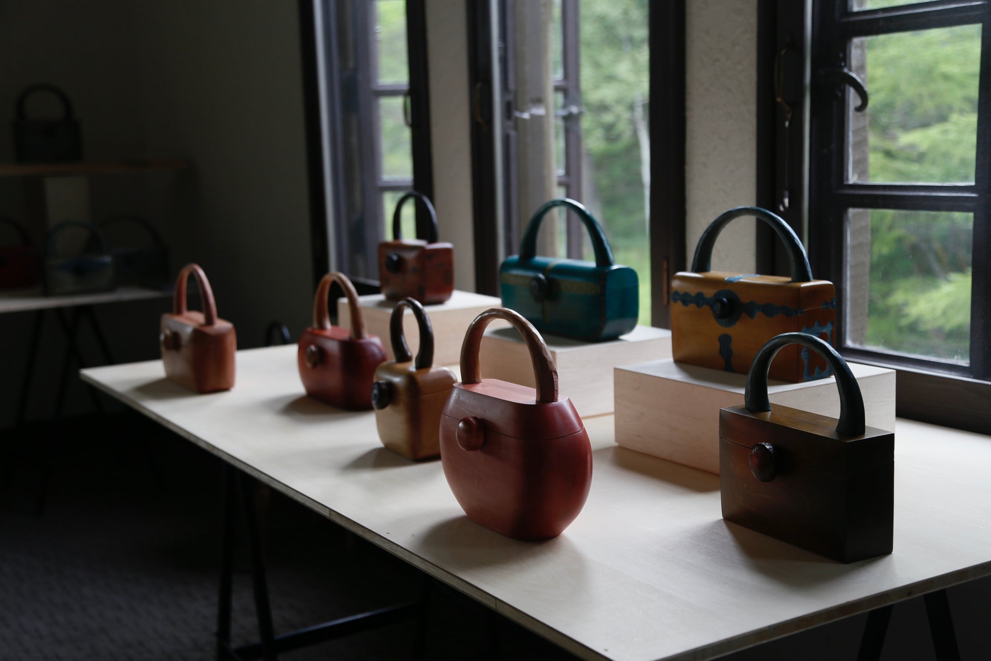 Wooden Bags lined up on the desk